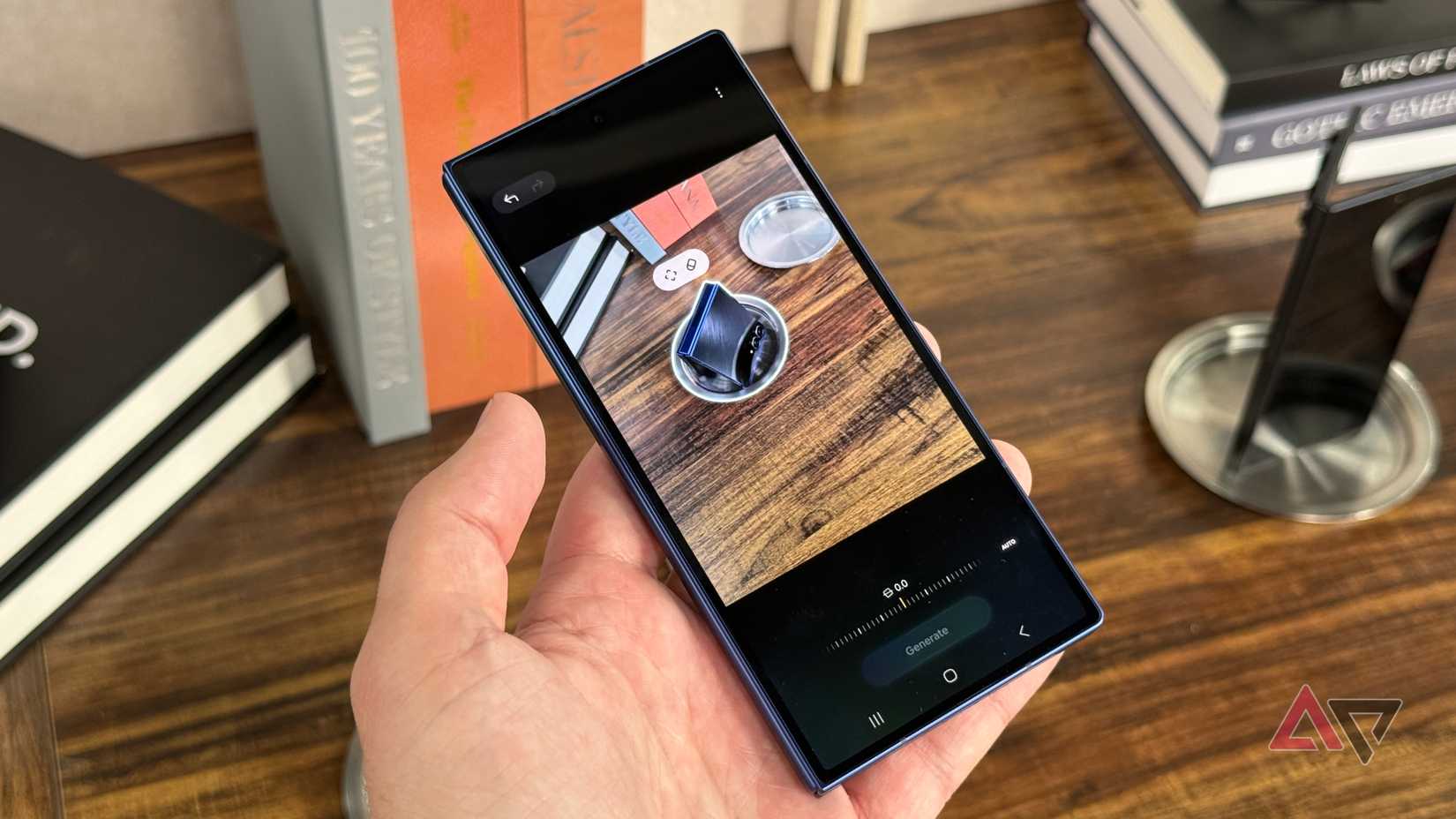 Samsung Galaxy S25+ sitting on back of wooden deer