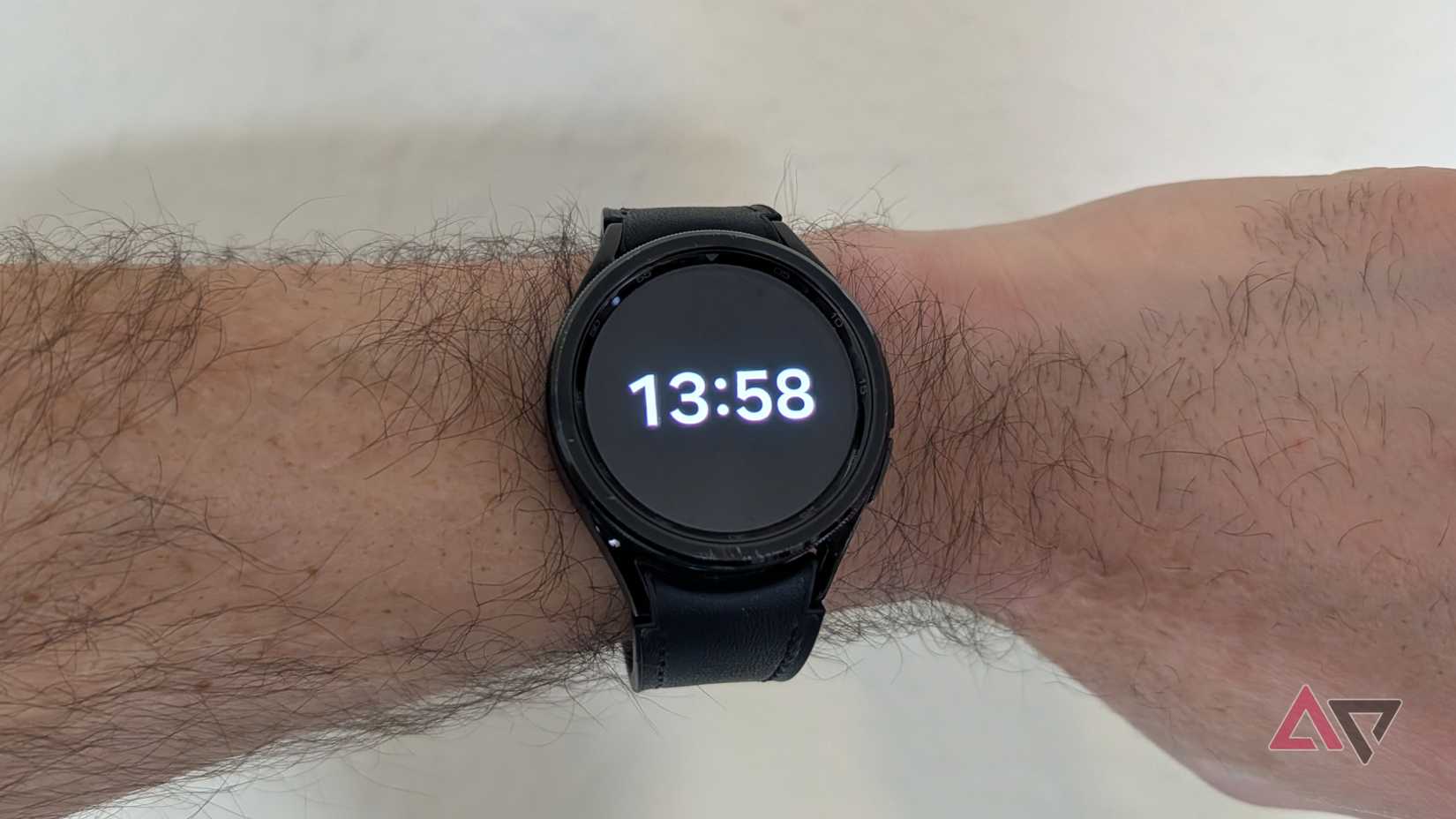 Gemini logo and the Google Assistant logo blurred beside it.