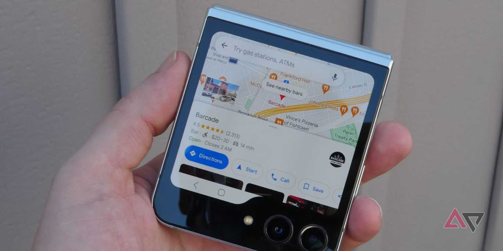 A Pixel 9 Pro open to quick settings, sitting upright among puzzle pieces.