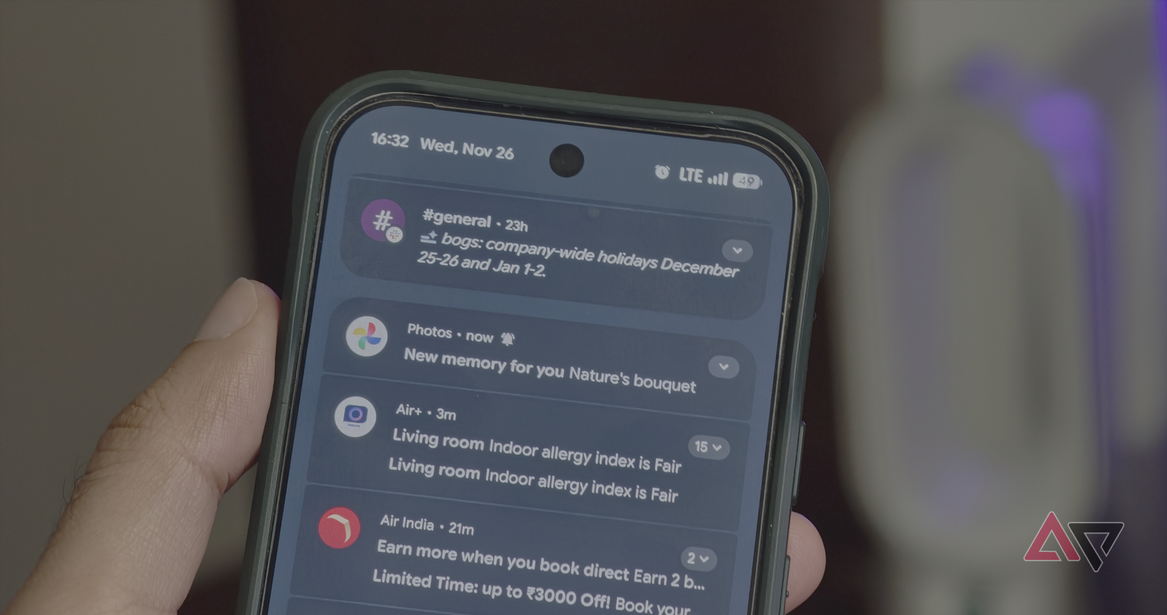 Android mascot with a power toggle set to off, partially hidden behind the number 16, symbolizing disabled Android 16 features.