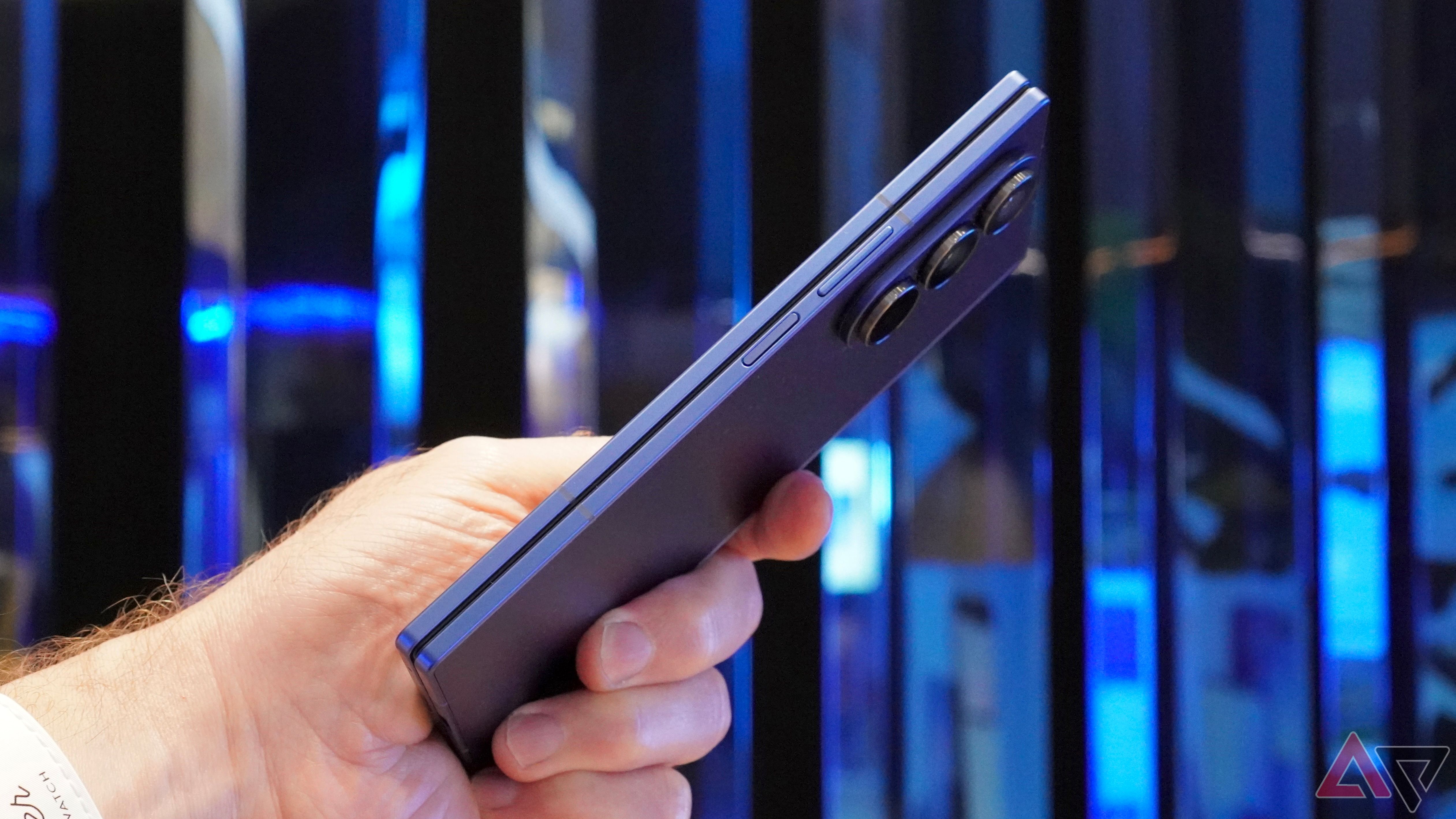 A person holding the Samsung Galaxy Z Fold 7, showing the buttons