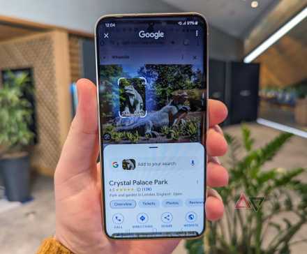 hand holding android phone with device verification notification