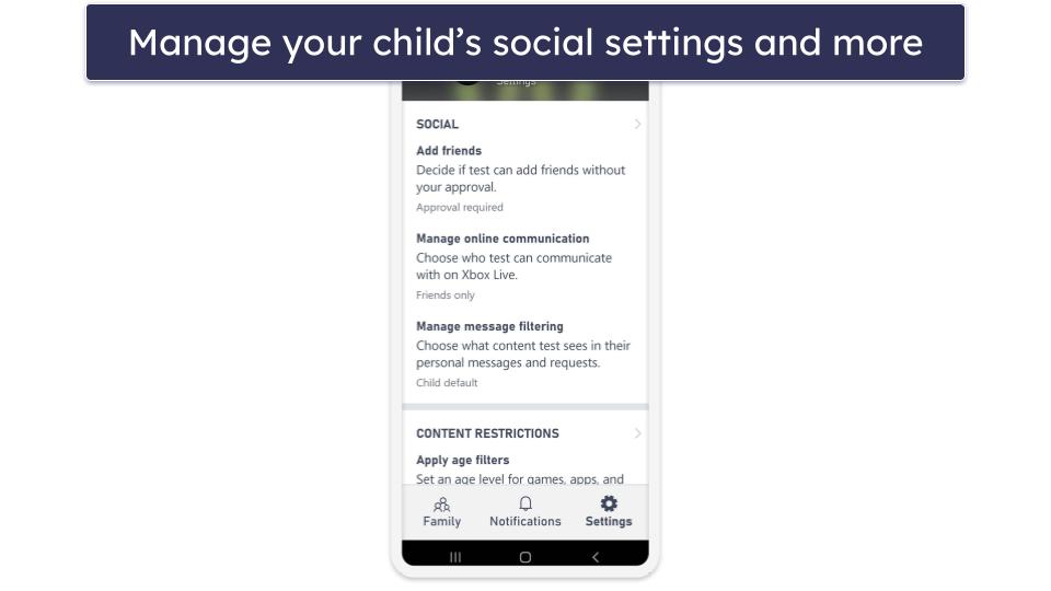 Nothing Headphones (1) on a brick wall with flowers in background
