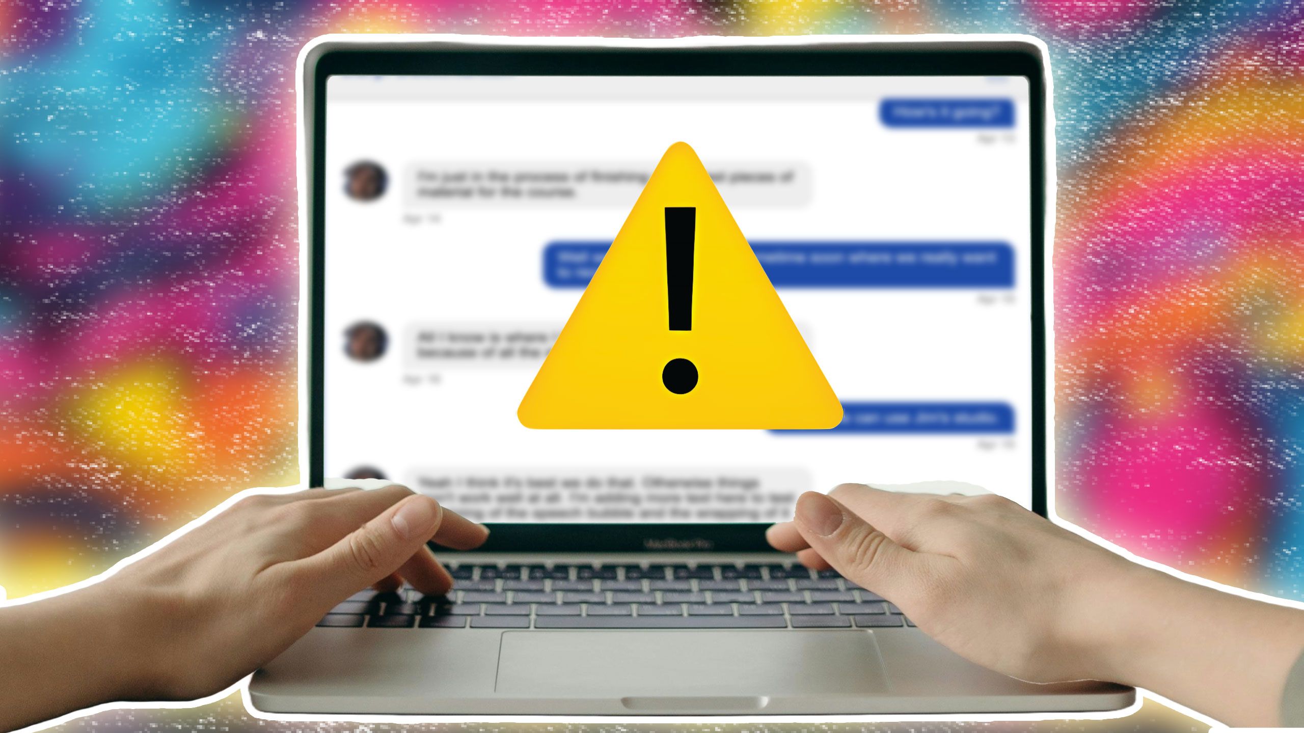 An image of hands on a laptop keyboard with a yellow warning icon on the display