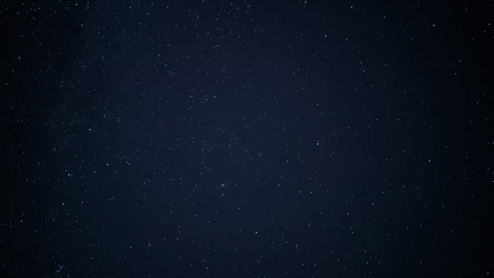 Sony WF-1000XM5 in charging case on a white background