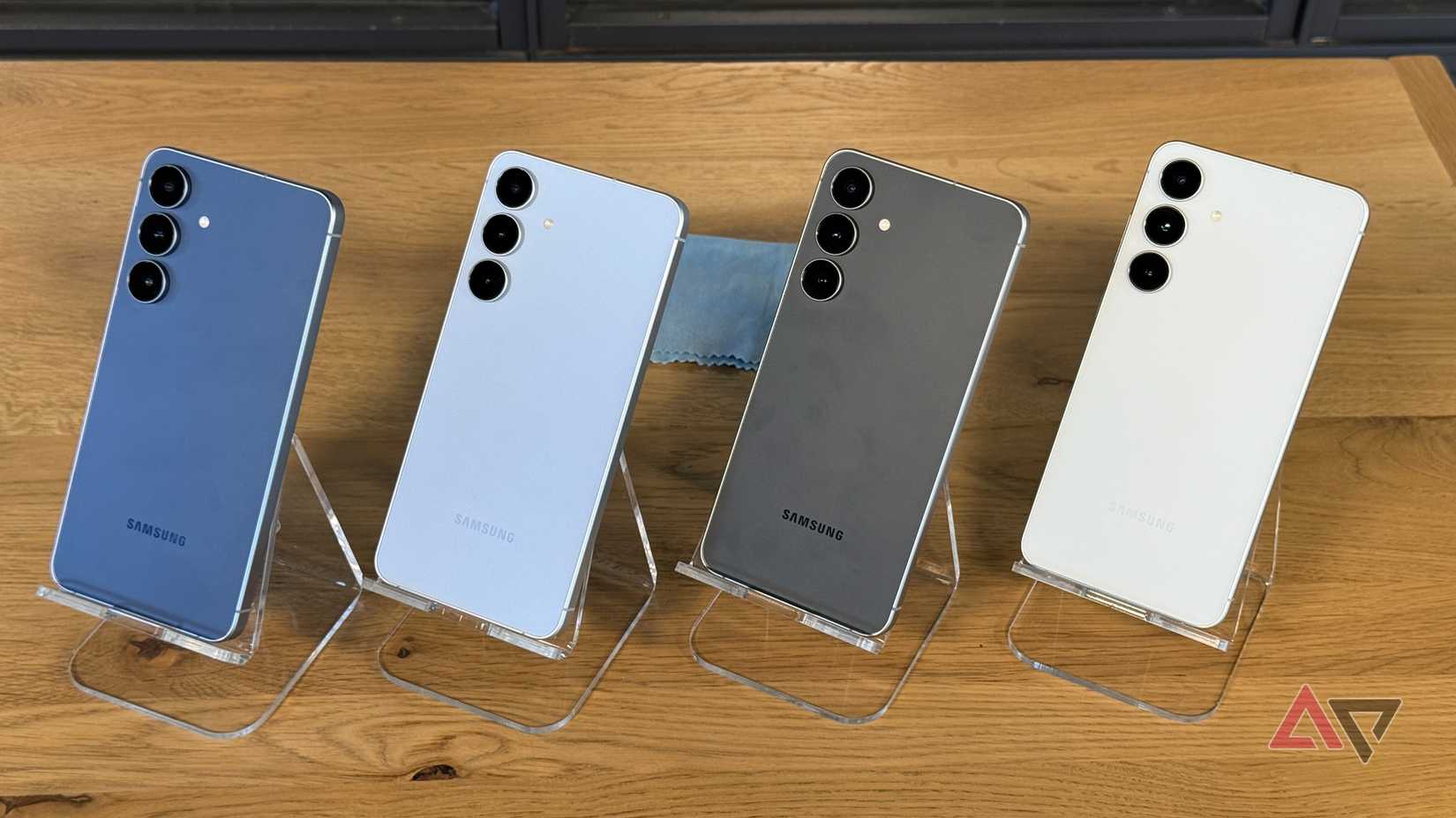 A rumored potential Pixel 10 appearance over an image of a crossed out Qi2 symbol.