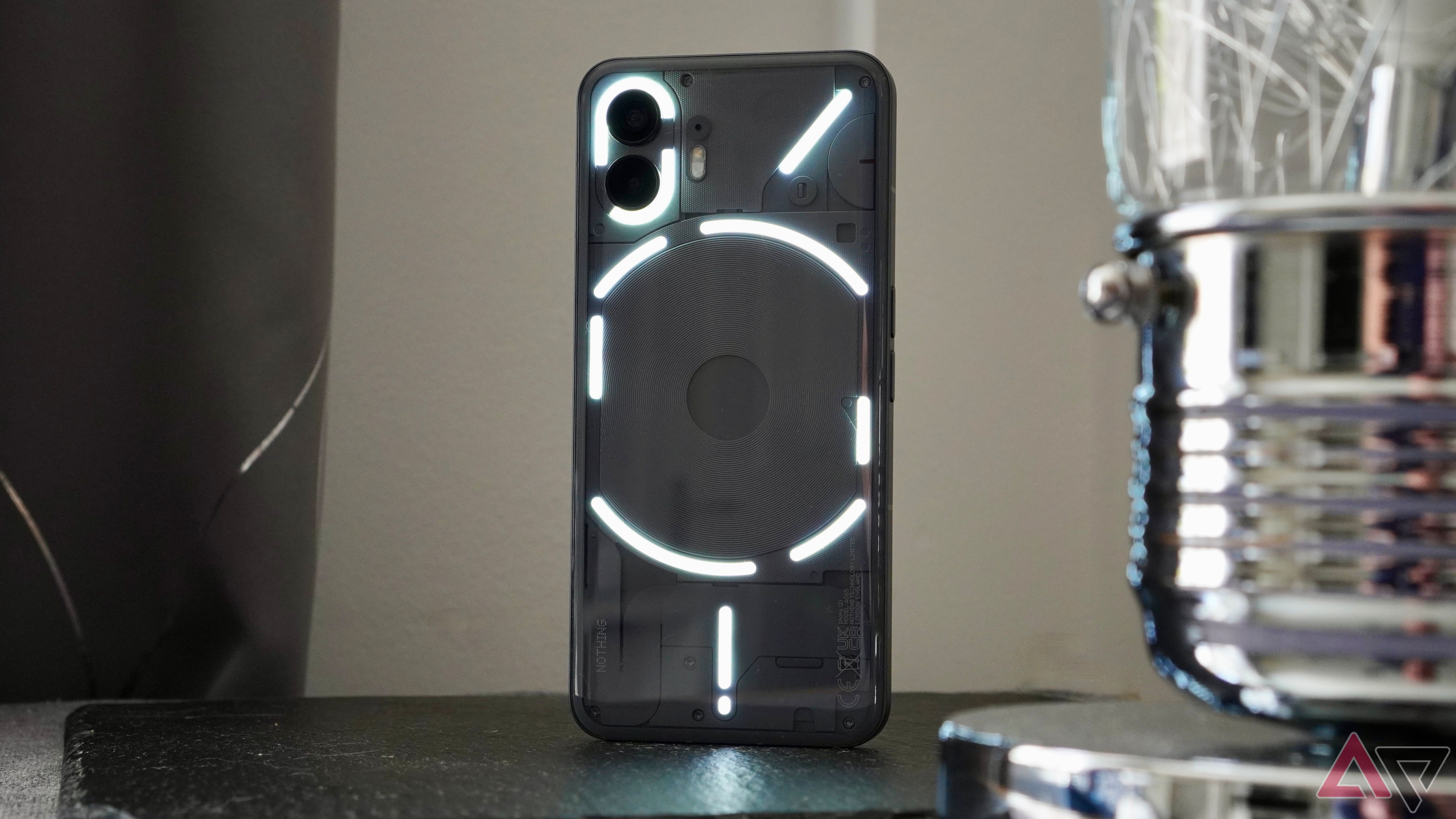 The Nothing Phone 2 with the Glyph Interface lights active