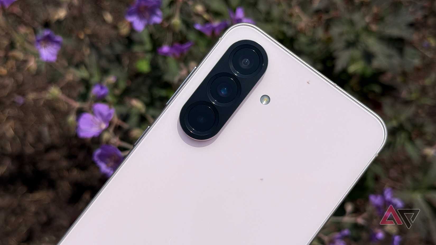 Photo of a Pixel 9 Pro on a Pixel Stand wireless charger.