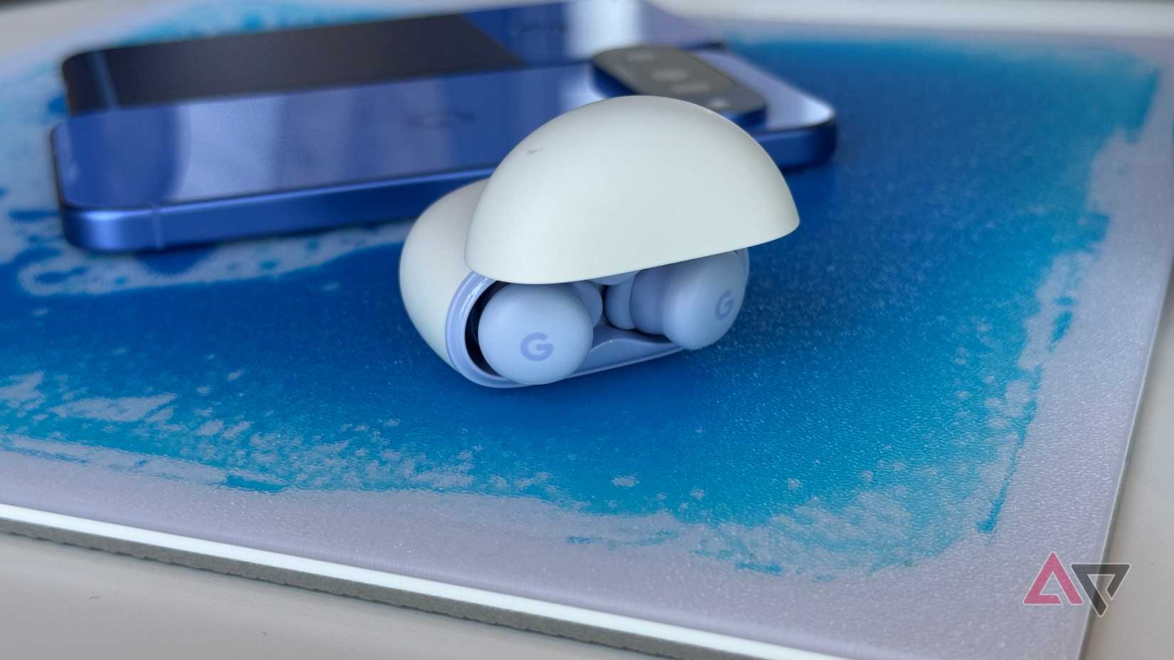 CMF Buds Pro 2 in white sitting in their case