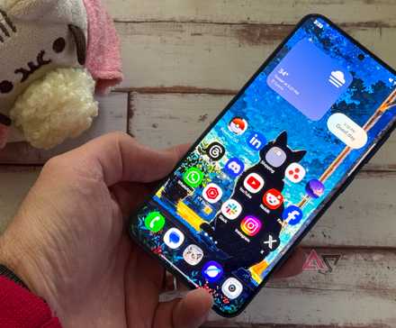 Google PIxel 9 Pro XL sitting next to Pusheen