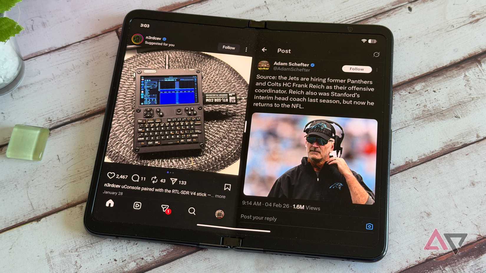 a smartphone displaying icons for tools apps next to a plastic ruler on a green mat